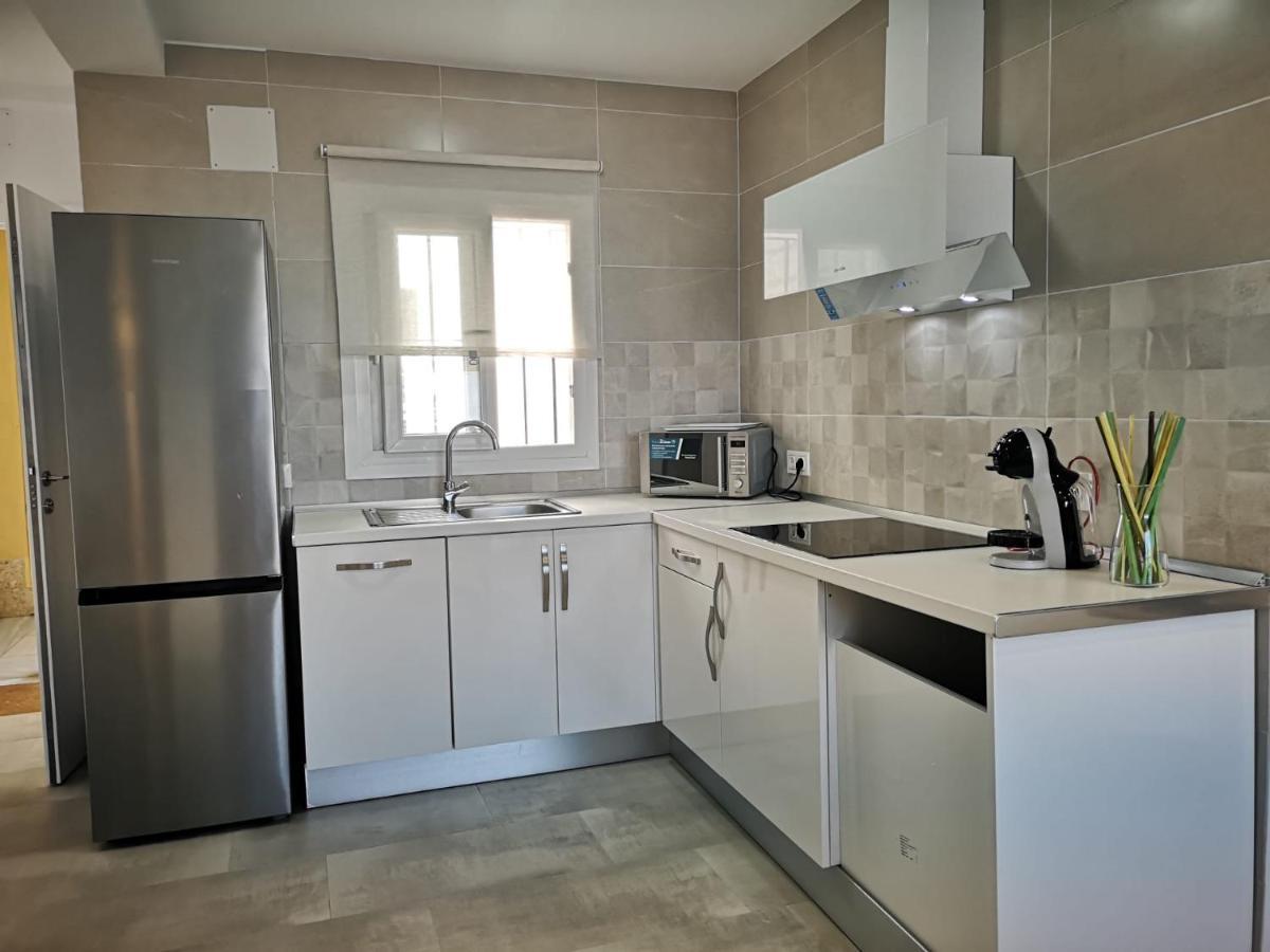 Apartamento Suite Arco De La Villa,Solo Familia Y Parejas,Parking Gratuito โกนิล เด ลาฟรอนเตรา ภายนอก รูปภาพ