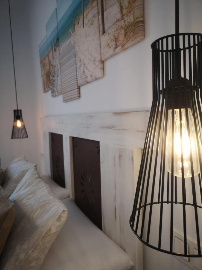 Apartamento Suite Arco De La Villa,Solo Familia Y Parejas,Parking Gratuito โกนิล เด ลาฟรอนเตรา ภายนอก รูปภาพ