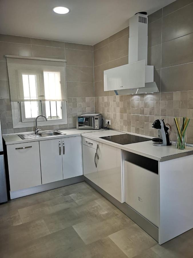 Apartamento Suite Arco De La Villa,Solo Familia Y Parejas,Parking Gratuito โกนิล เด ลาฟรอนเตรา ภายนอก รูปภาพ