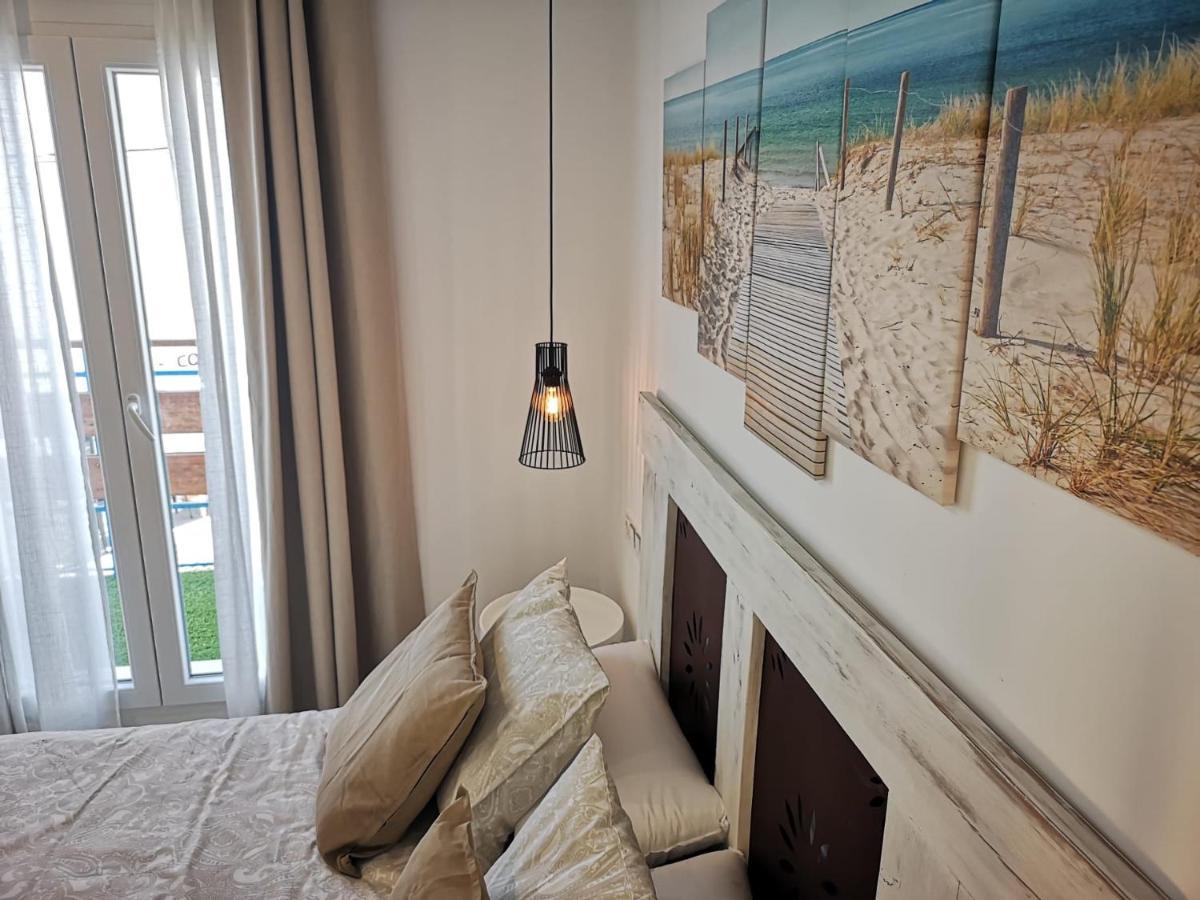 Apartamento Suite Arco De La Villa,Solo Familia Y Parejas,Parking Gratuito โกนิล เด ลาฟรอนเตรา ภายนอก รูปภาพ